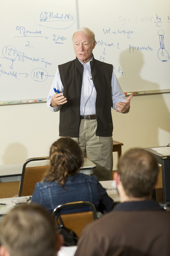 Michael Lewis, professor emeritus of brewing science at UC Davis, and the academic director and lead instructor of UC Davis Extensionâs Professional Brewing Programs photographed while teaching a class at Sudwerk Brewery in Davis.